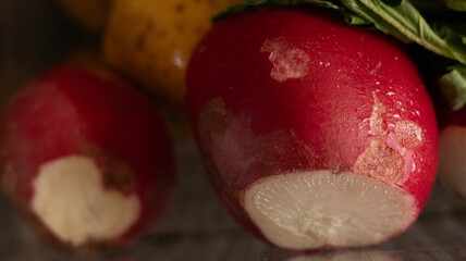 Raw Radishes and Vegetables. Close Up of Fresh Produce with Natural Imperfections and Vibrant Colors