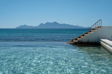 Obraz premium Tranquil pool overlooking tranquil ocean