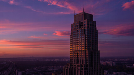Windows in high-rises reflect the last golden rays o daylight