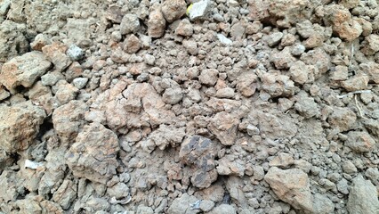High quality brown soil clay texture macro close up of ground surface for agriculture geology farming construction environment and nature projects