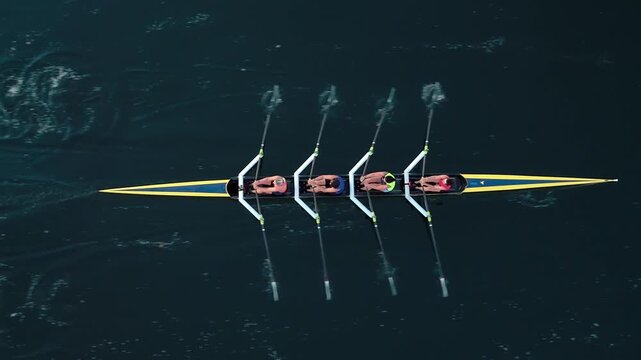 Top View Athletes Move In Perfect Sync Over The Calm Blue Waters Of The Atlantic. Captured From Above, This Nova Scotia Scene Shows Morning Energy, Focus, And Beauty.