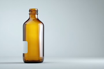 Amber glass bottle with a blank label