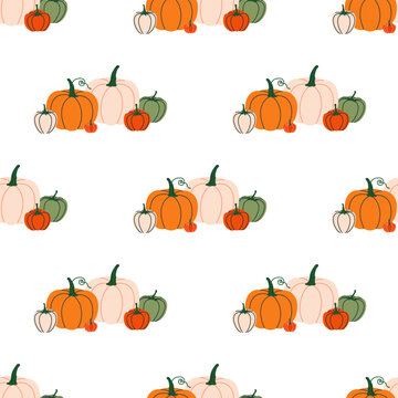 Autumn pumpkins and gourds creating seamless harvest pattern