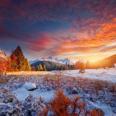 Evening landscape lit by the first snow of winter; beautiful, stunning and wild landscape photography during sunset time on mountains