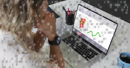 Mid-adult woman clicking owl NFT on home office laptop and watching trend graph drawing for finance - Powered by Adobe