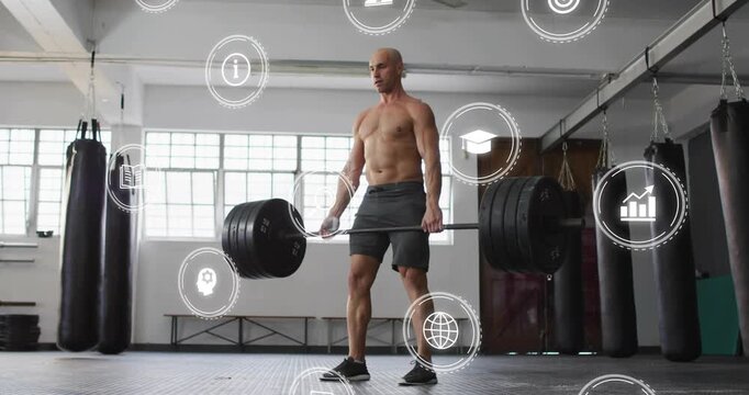 Athlete gripping barbell and lifting in fitness training while glowing data icons showing progress
