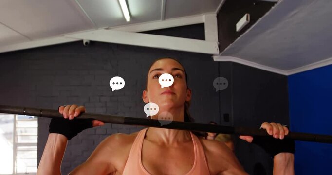 Adult female gripping barbell in gym cleaning and pressing weight for strength with animated guide