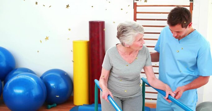 Senior woman gripping bars with therapist adjusting grip for stepping and guiding posture in rehab