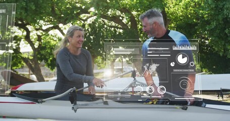 lifting oars into riggers, rowing athletes viewing data graphs guiding alignment stability testing - Powered by Adobe