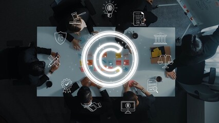 A diverse business team collaborates around a conference table, with copyright symbols and legal icons, focusing on innovative strategies and ideas in a modern office environment. Raster