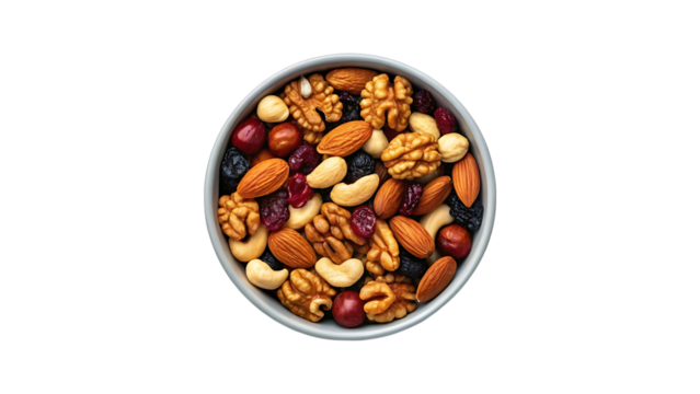 Healthy snack mix of assorted nuts and dried fruits in a bowl top view isolated on transparent background