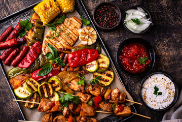 Assortment of grilled bbq meat and vegetables
