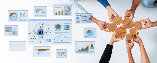 Obraz premium A diverse group collaborates on artificial intelligence strategies, highlighting data charts and gears, showcasing teamwork and innovation in a modern workspace. Trope