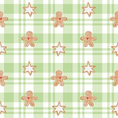 Seamless watercolor pattern with gingerbread cookies in the shape of stars and men on green plaid background. Perfect for Christmas wrapping paper, textile, fabric print, wallpaper, and holiday design