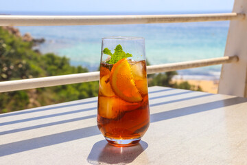 Tropical cocktail on a table with sea view