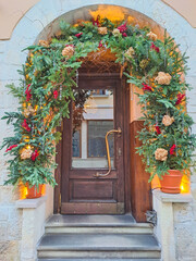 Charming building entrance decorated for Christmas