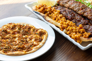 Close-up of traditional Turkish shish kebabs on oval plate