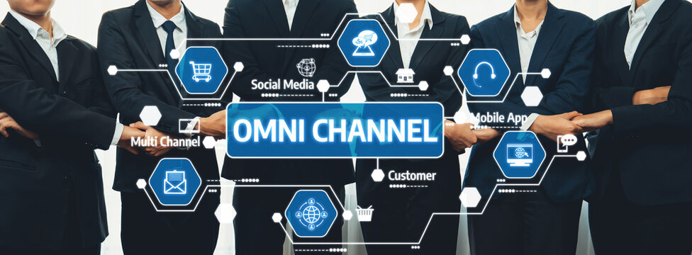 A professional business team discussing an omni-channel strategy, enhanced by digital icons representing various communication methods and technology solutions. Amity