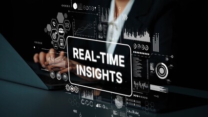 Professional Businesswoman Analyzing Real-Time Insights with Modern Technology Interface in Office Environment. Asymptotic smart data analytic.