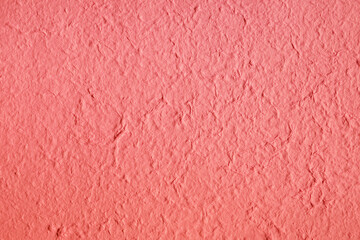 dusty, flaky red mulberry paper with a brittle, chalky surface