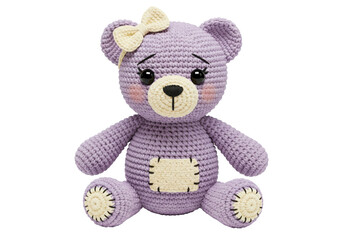 Cute purple crochet teddy bear with bow isolated on transparent background, handmade stuffed animal