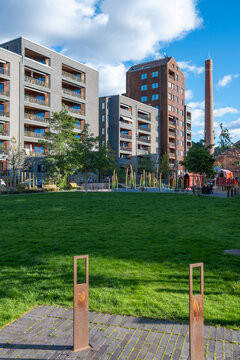 Scandinavian design gardens in Stockholm residential developments, sustainable living integrated with apartment fa&ccedil;ades and landscaped public spaces for urban innovation