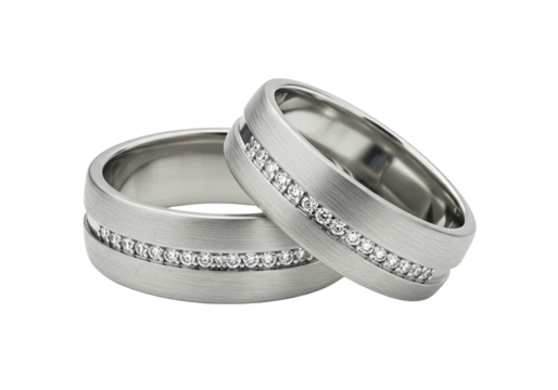 Pair of silver wedding rings with diamonds isolated on white, jewelry for marriage ceremony