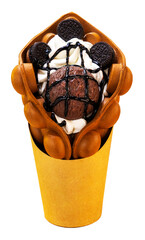 bubble waffle with various fruits and chocolate in a paper cup.