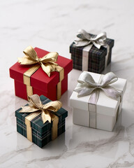 Fototapeta premium Four exquisitely wrapped gift boxes with luxurious bows on a marble surface ready for gifting