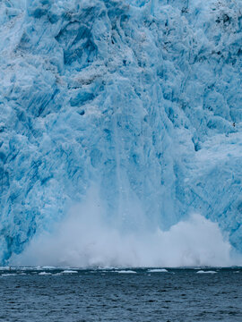 Capturing the explosion of water as ice sheets calve off the Aialak Glacier