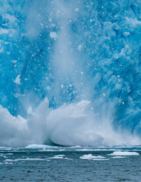 Capturing the explosion of water as ice sheets calve off the Aialak Glacier