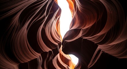Sunlight shines into antelope canyon creating a beautiful natural light show in arizona