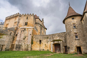 Landscape view of main courtyard of famous Biron medieval castle, Dordogne, France