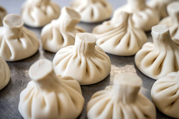 Raw khinkali dumplings ready for cooking
