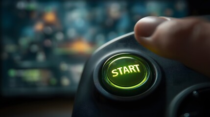 Fototapeta premium Gamer's Hand Pressing Glowing Green START Button on Controller to Begin the Immersive Video Game.