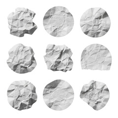 Naklejka premium Eight blank, circular white paper stickers, dynamically crumpled and creased with rough matte texture, one with a delicate tear, isolated on a transparent background. Textural study concept