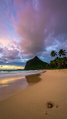 Sunrise beach scene with mountain