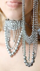 Close-up of ornate silver necklace