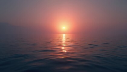 Fototapeta premium Sun sets over calm ocean water creating a peaceful and serene atmosphere. The golden hour light reflects on the gentle waves. Evening scene by the sea.