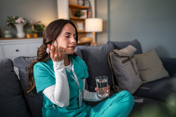 Nurse applying gua sha for self-care facial massage