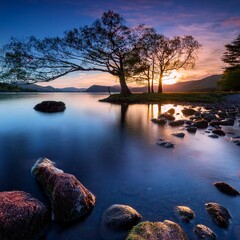 At dusk amidst the scenery and trees Romantic evening in lake district with beautiful sky; 