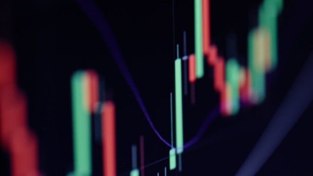 Closeup growing business chart. Stock market graph on black background macro