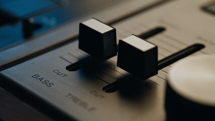 Macro faders vintage sound recorder in professional studio. Closeup sliders © stockbusters