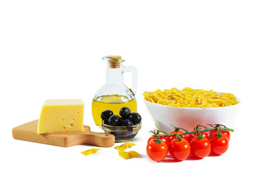 Ripe juicy tomatoes, farfalle pasta, cheese, olive oil.  Italian cuisine.