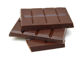 Chocolate pieces on white background