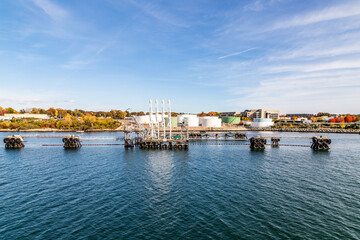 view to skyline of Groton from the seaside with view to industrial area with tank farm
