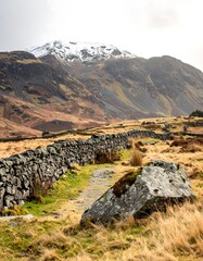 Mountain path through a stone wall