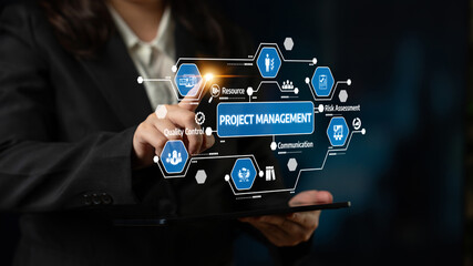 A business professional interacts with a touchscreen displaying project management concepts, emphasizing digital tools in enhancing productivity and collaboration. Tessel