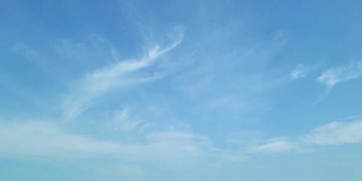Cloudscape, Timelapse of beautiful blue sky with thin clouds on bright summer day, for a background	