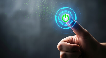 Fototapeta premium Finger pressing glowing power button, technology concept.